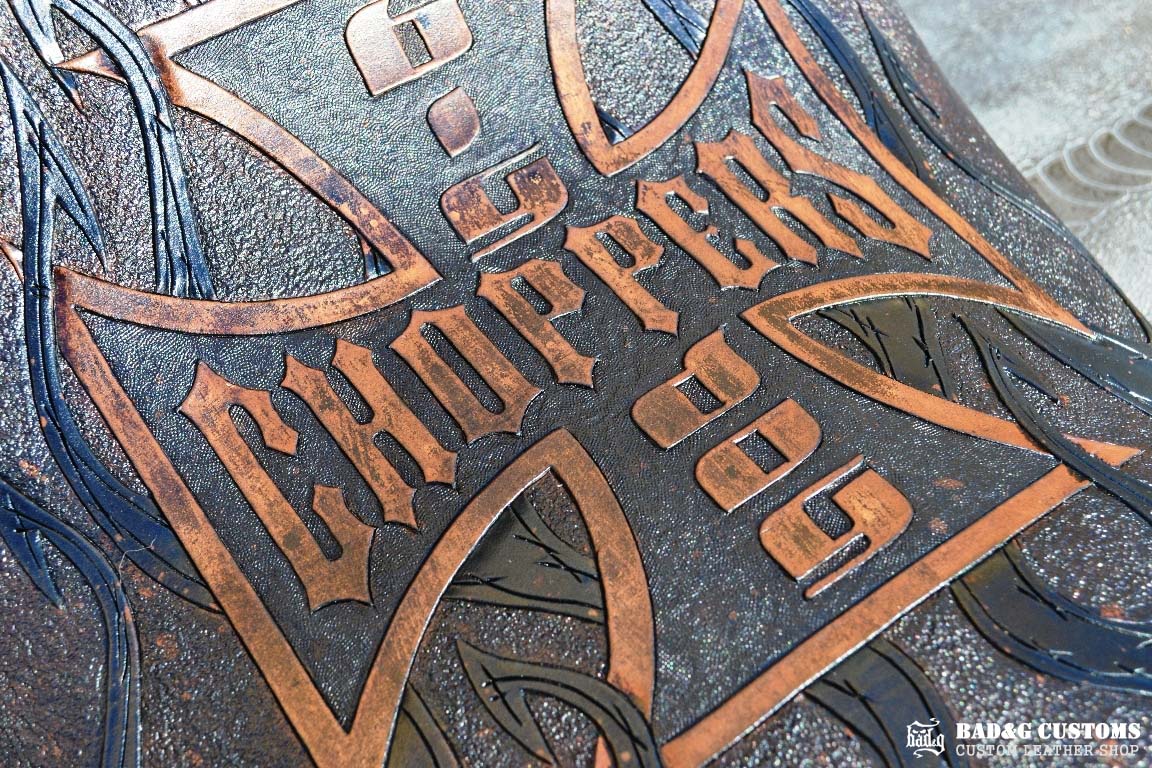 "Big Dog Choppers" logo design hand tooled and braided. Antiqued Blue Veg tan leather with kangaroo lace. West Coast Choppers for Life!