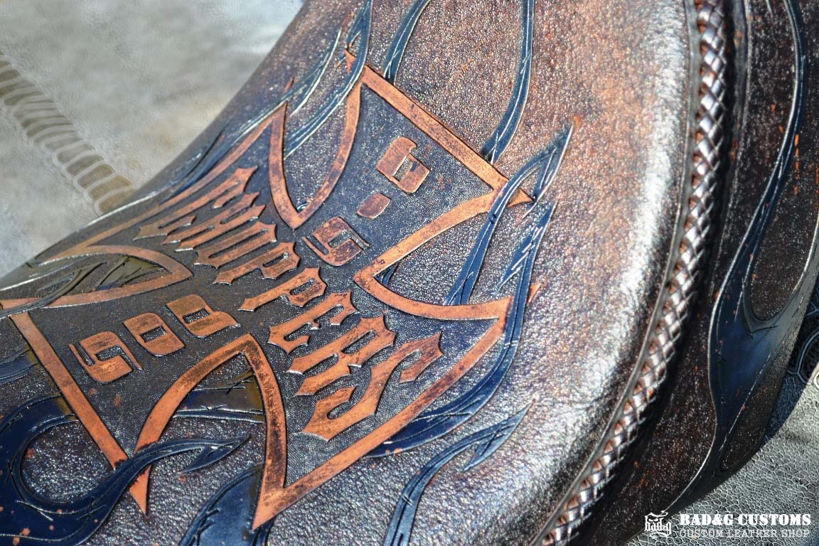 "Big Dog Choppers" logo design hand tooled and braided. Antiqued Blue Veg tan leather with kangaroo lace. West Coast Choppers for Life!