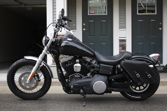 Upgrade your Harley-Davidson® Dyna with the DL051 Dyna Left Side Solo Bag. Hand crafted in USA with premium leather and top quality hardware. Durable and stylish, it's the perfect saddlebag for your motorcycle.